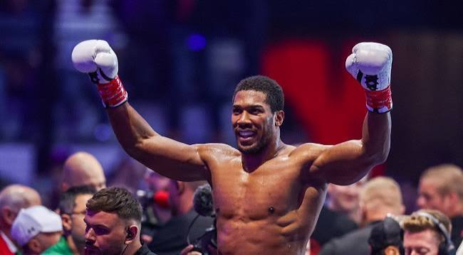 Anthony Joshua Battles Back from Two Knockdowns to Stop Prenga