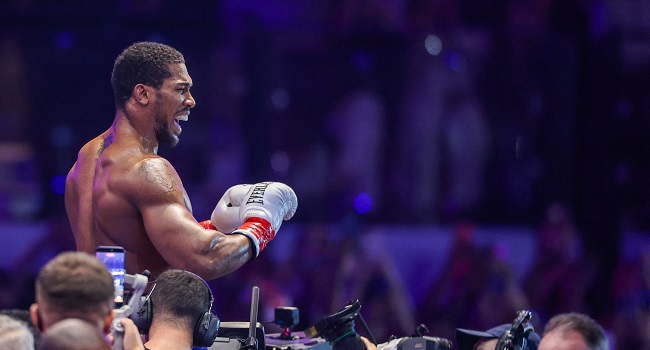Anthony Joshua Battles Back from Two Knockdowns to Stop Prenga