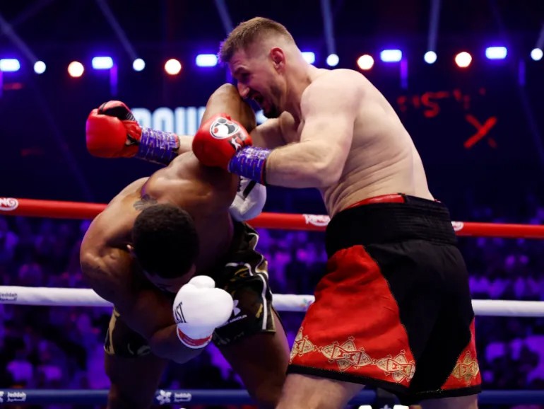 Anthony Joshua Battles Back from Two Knockdowns to Stop Prenga